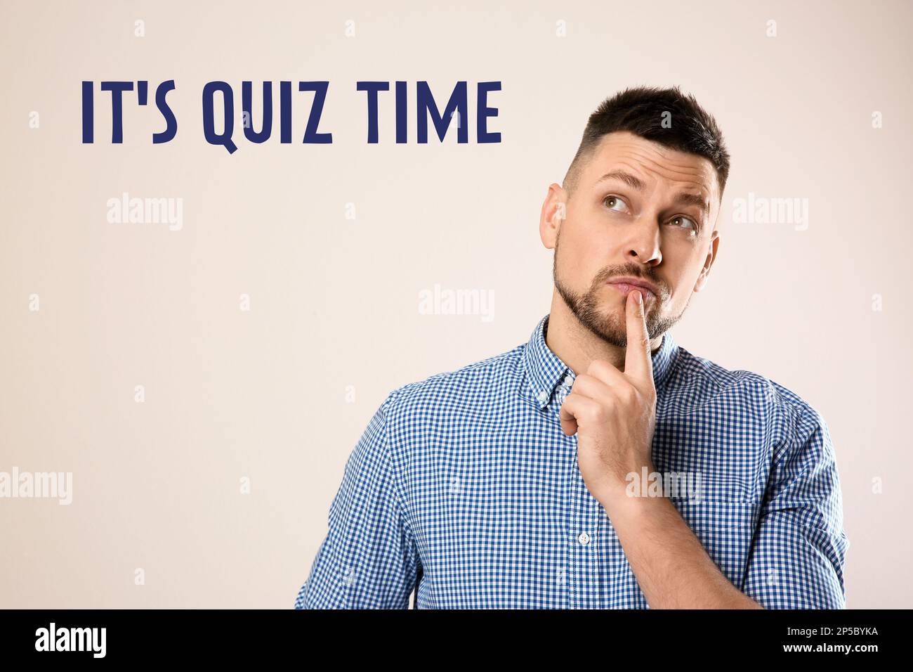 Thoughtful man and phrase IT'S QUIZ TIME on white background Stock ...