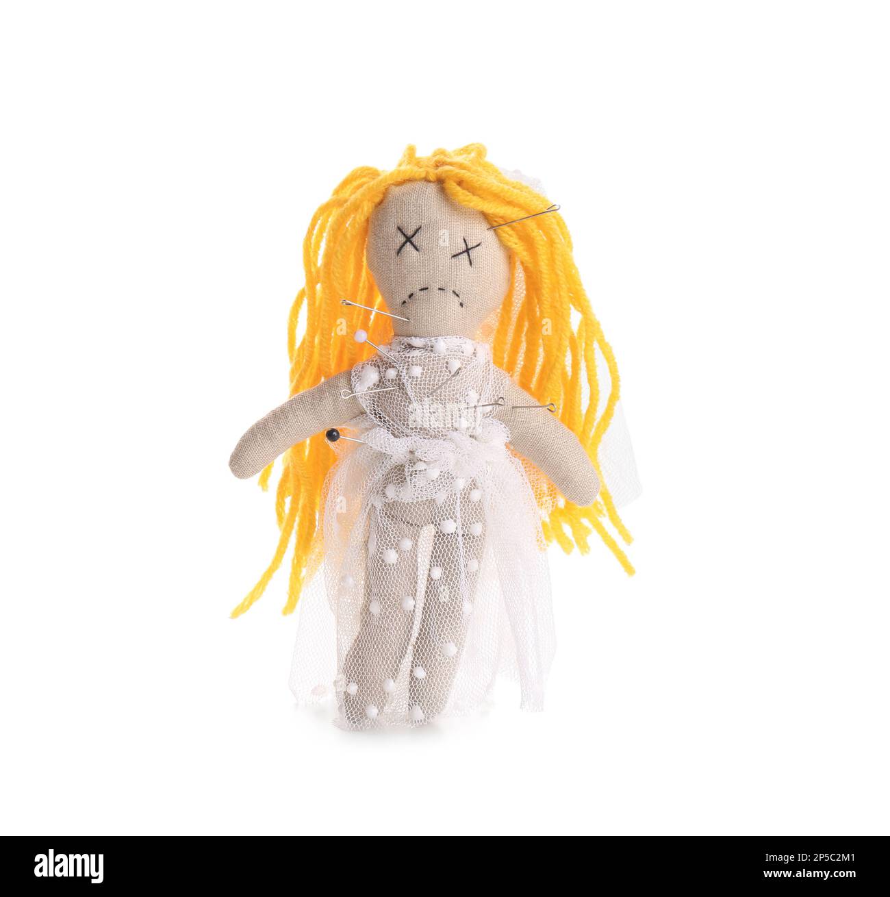 Woman stabbing voodoo doll with pin on white background closeup
