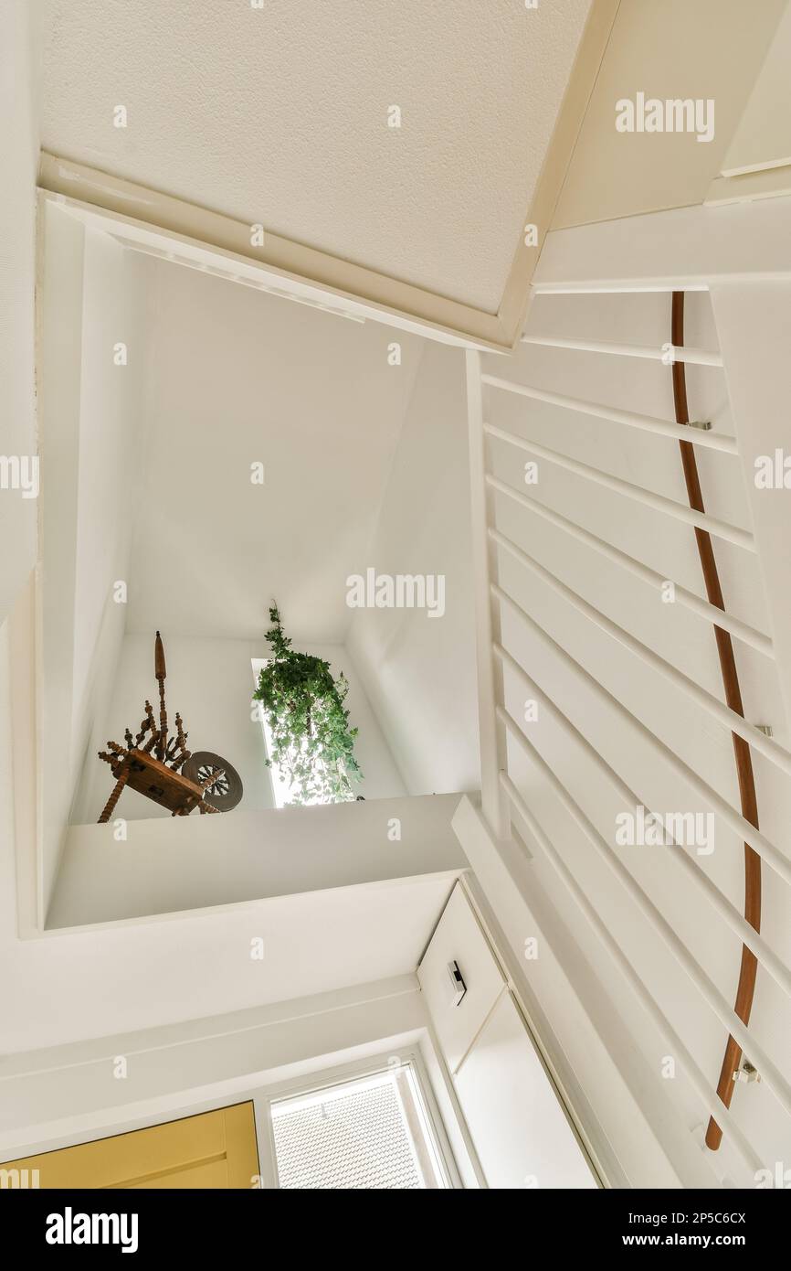 a room with white walls and wood trim on the ceiling, showing how it's