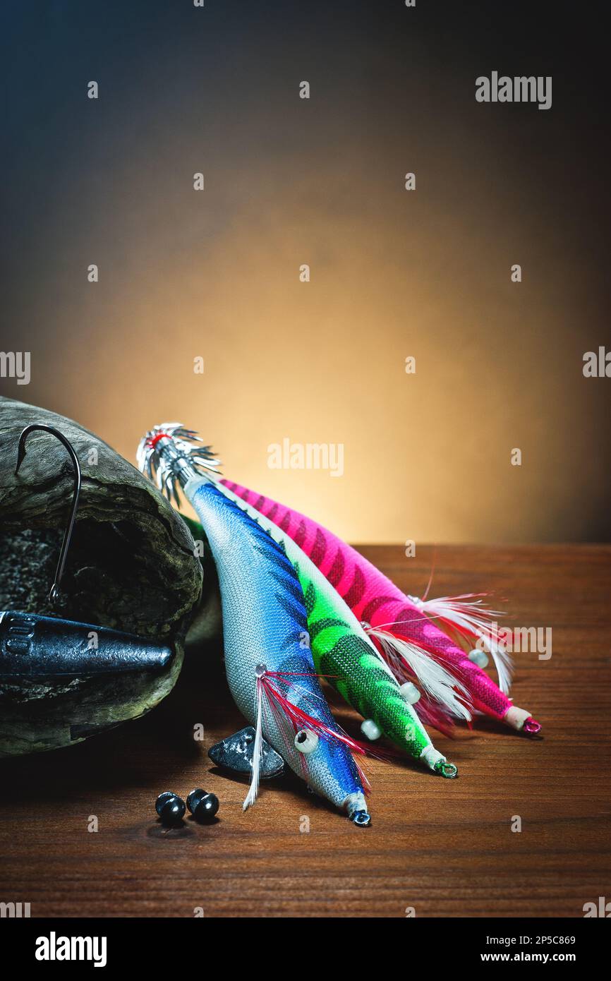 Artificial bait for fishing with hooks and sinkers on wood, for