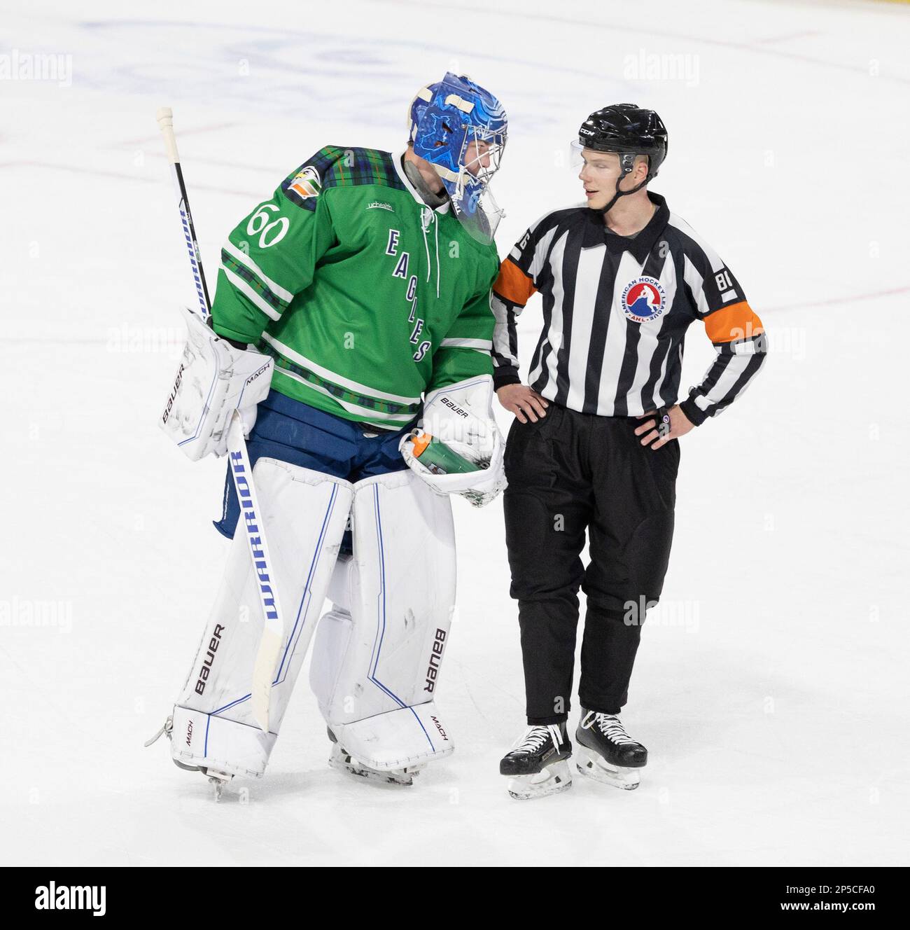 Loveland, Colorado, USA. 4th Mar, 2023. Eagles G JUSTUS ANNUNEN chats with an AHL Referee Saturday night at the Budweiser Events Center. The Wranglers beat the Eagles in a Shootout 6-5. (Credit Image: © Hector Acevedo/ZUMA Press Wire) EDITORIAL USAGE ONLY! Not for Commercial USAGE! Stock Photo