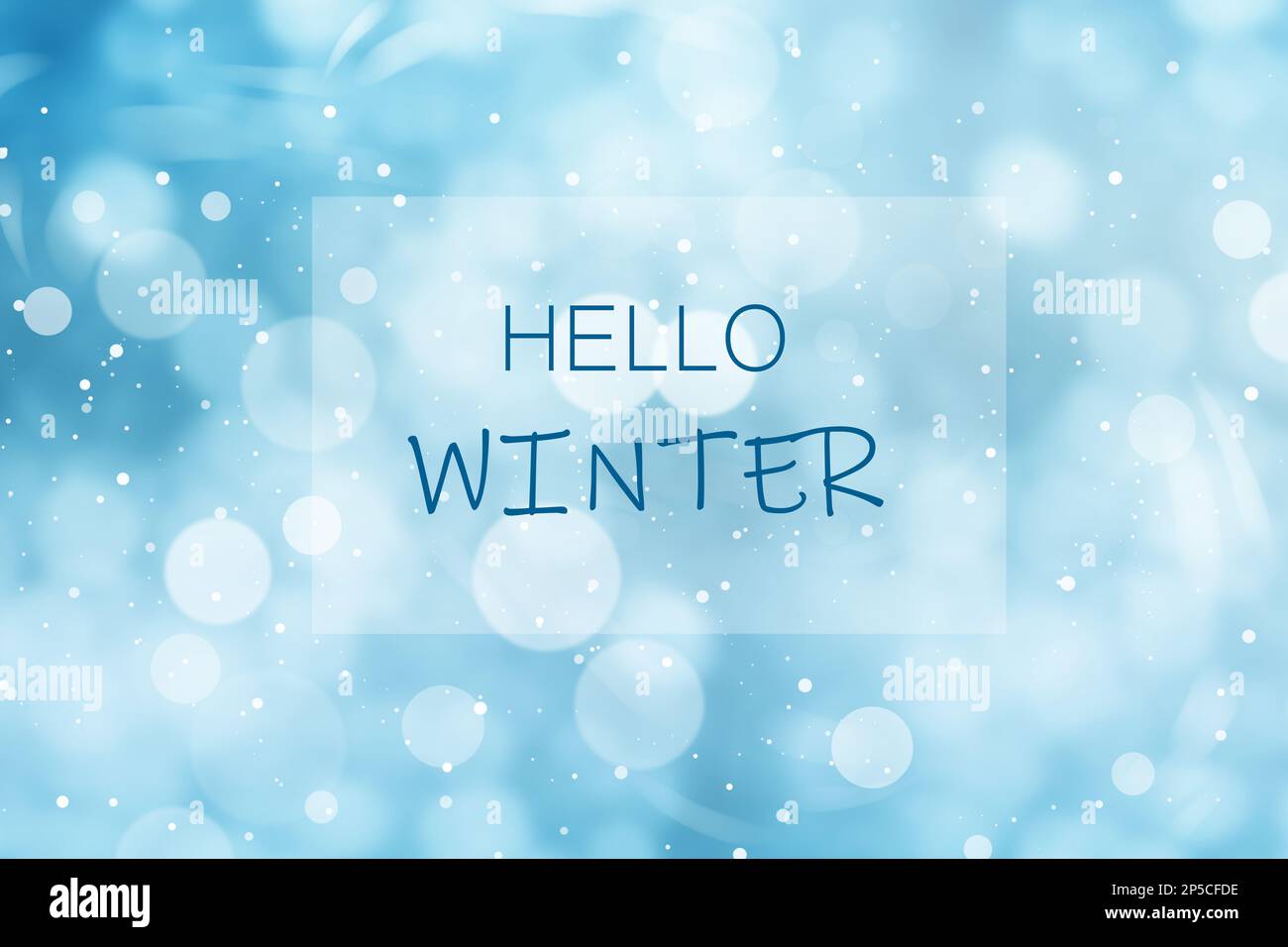 Phrase Hello Winter and snowfall on light blue background, bokeh effect ...