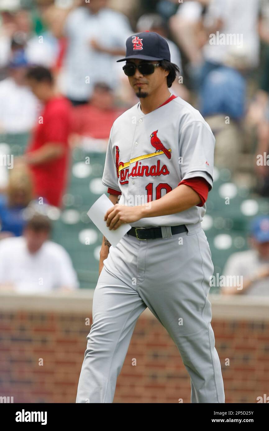 CHICAGO, IL - MAY 12: Kyle Lohse #26 of the St. Louis Cardinals dresses as Tony LaRussa as he walks off the field after exchanging line up cards prior to the game CHICAGO, IL - MAY 12: Kyle Lohse #26 of the St. Louis Cardinals dresses as Tony LaRussa as he walks off the field after exchanging line up cards prior to the game
