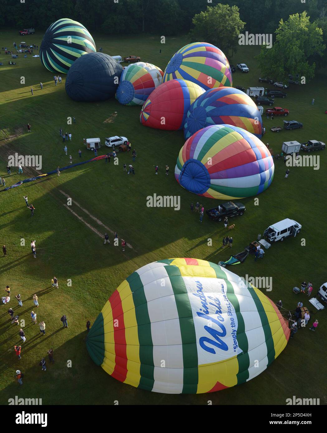 Balloonists inflate as they prepare to fly out of Point Mallard Park in ...