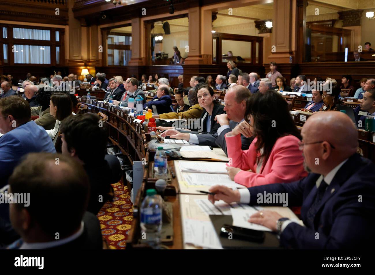 Lawmakers vote on HB 462 in the House chambers during crossover day at