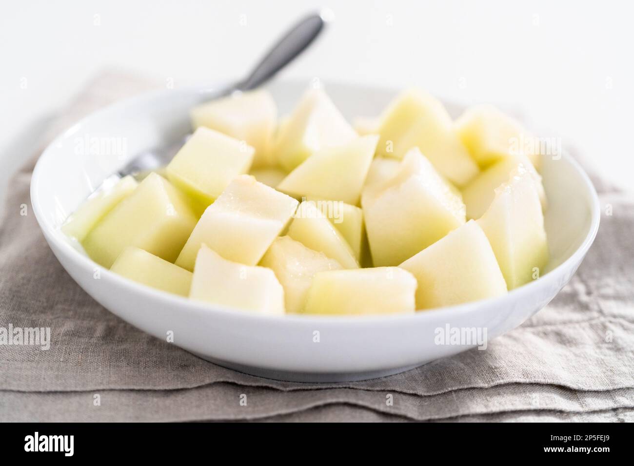 Golden dewlicious melon Stock Photo Alamy