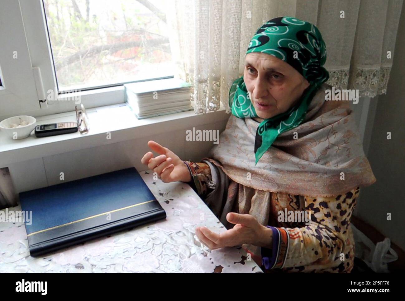 In this image taken from a video, Patimat Suleimanova, the aunt of USA  Boston bomb suspects, speaks to The Associated Press in her home in the  Russian city of Makhachkala, Monday April