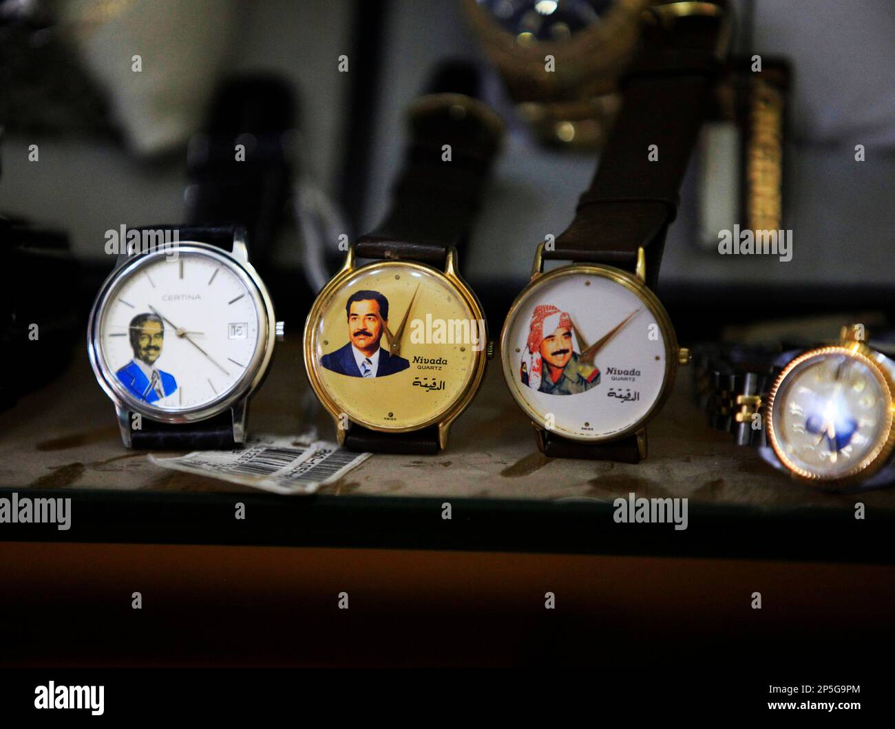 In this Sunday, April 7, 2013 photo, watches with image of the former