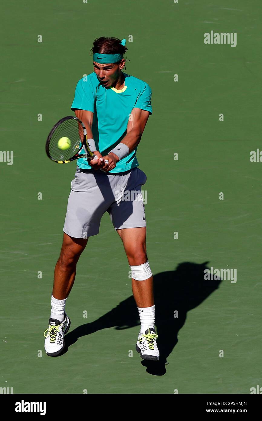 17 March, 2013: Rafael Nadal of Spain returns a shot to Juan Martin Del  Potro of Argentina during the singles final of the BNP Paribas Open at Indian  Wells Tennis Garden in
