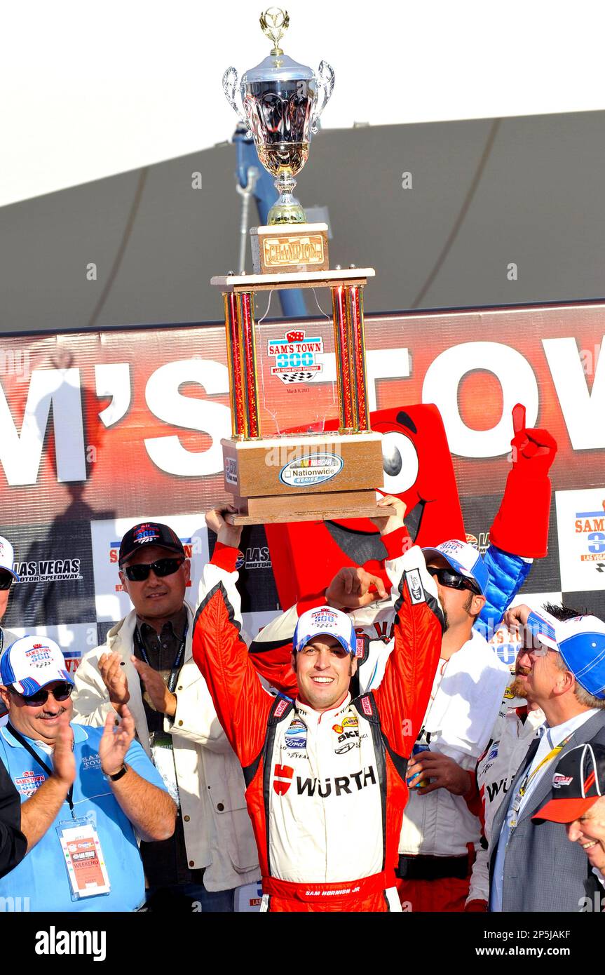 Sam Hornish Jr. celebrates in Victory Lane after winning the NASCAR