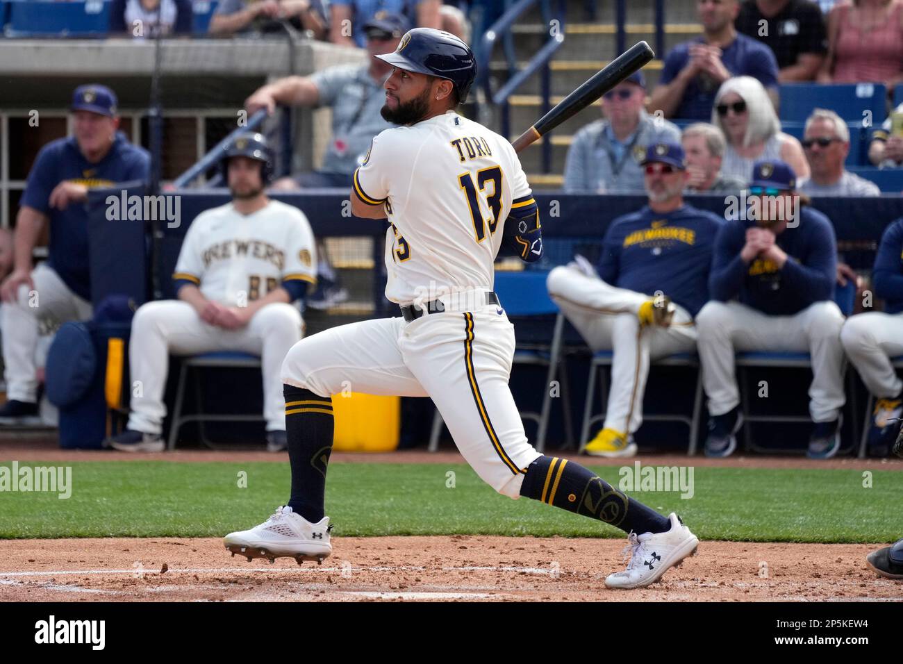 Milwaukee Brewers' Abraham Toro follows through on a swing during the