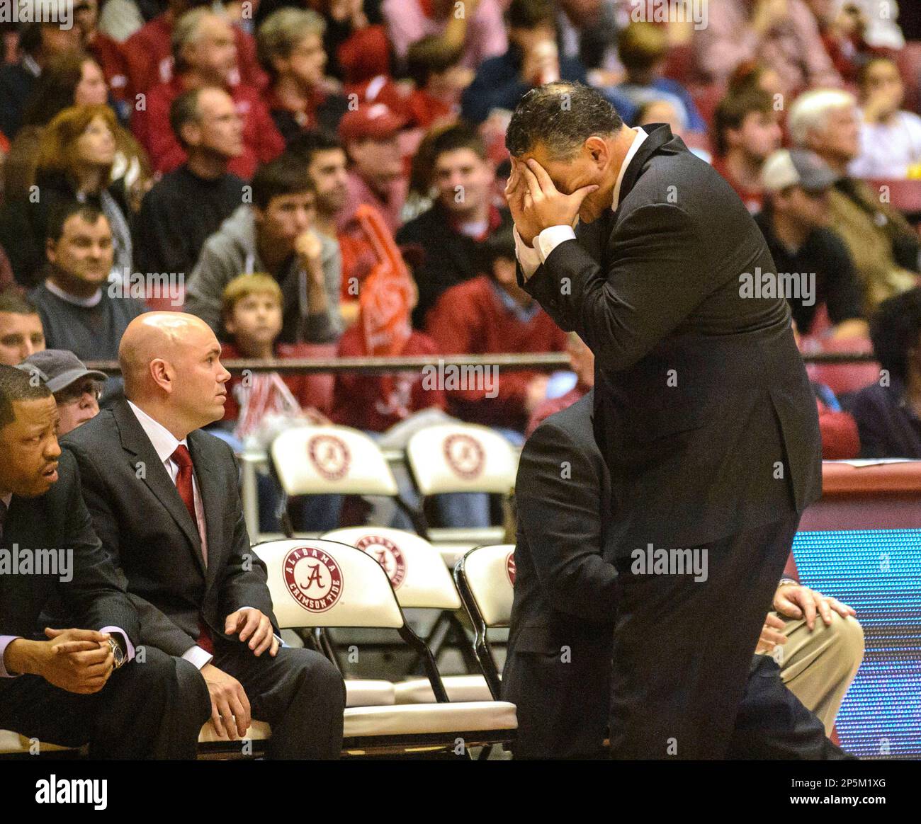 South Carolina coach Frank Martin rubs his head as his team struggles