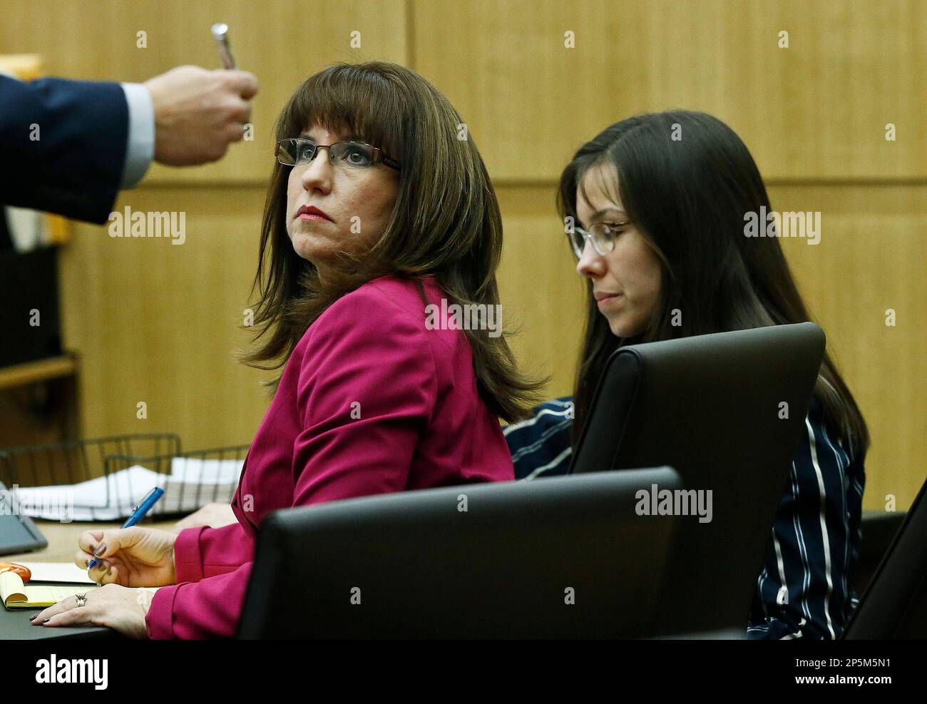 Jodi Arias, right, looks down as defense attorney Jennifer Willmott ...