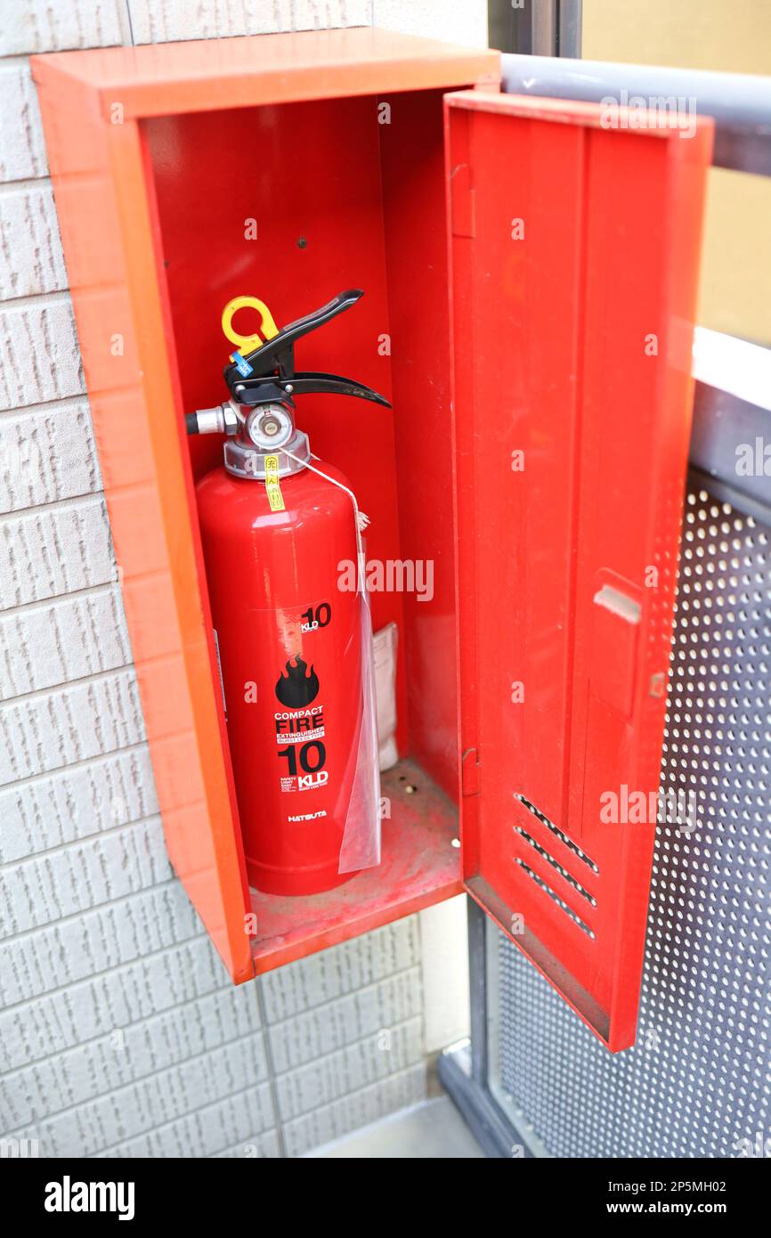 Tokyo, Japan, March 2023.Japanese fire extinguisher box and fire
