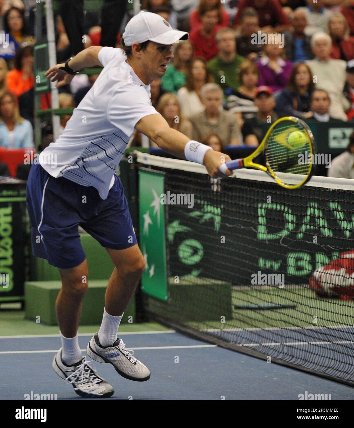 The United States Mike Bryan miss hits a a return at the net against Brazils Marcelo Melo and Bruno Soares during their Davis Cup doubles tennis match in Jacksonville, Fla