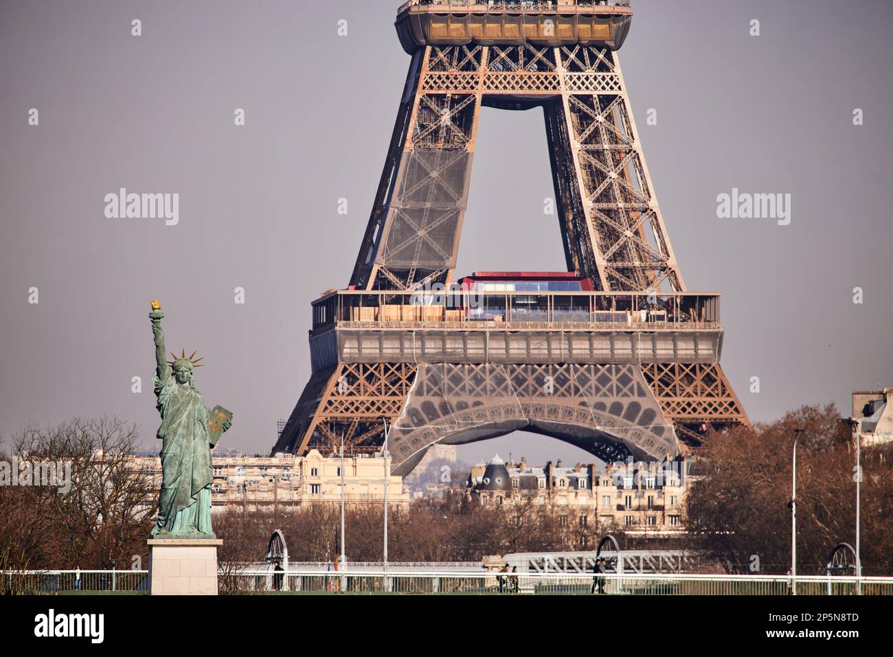 Paris landmark, Eiffel Tower and replica Statue of Liberty on the Île aux Cygnes, Stock Photo