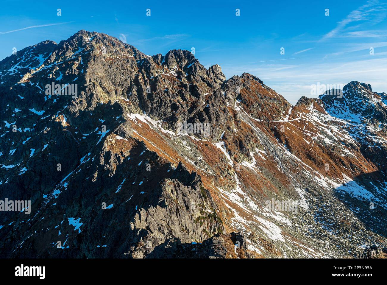 Amazing scenery of Sweinica, Zawrat and Zmarzle Czuby mountain peaks in autumn Tatra mountains Stock Photo