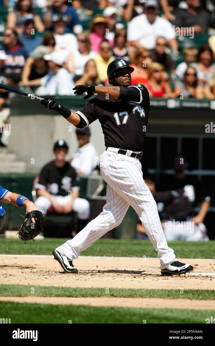CHICAGO, IL - AUGUST 14: Outfielder Ken Griffey Jr. #17 of the Chicago White  Sox follows through on his swing after hitting the baseball against the  Kansas City Royals at the U.S.