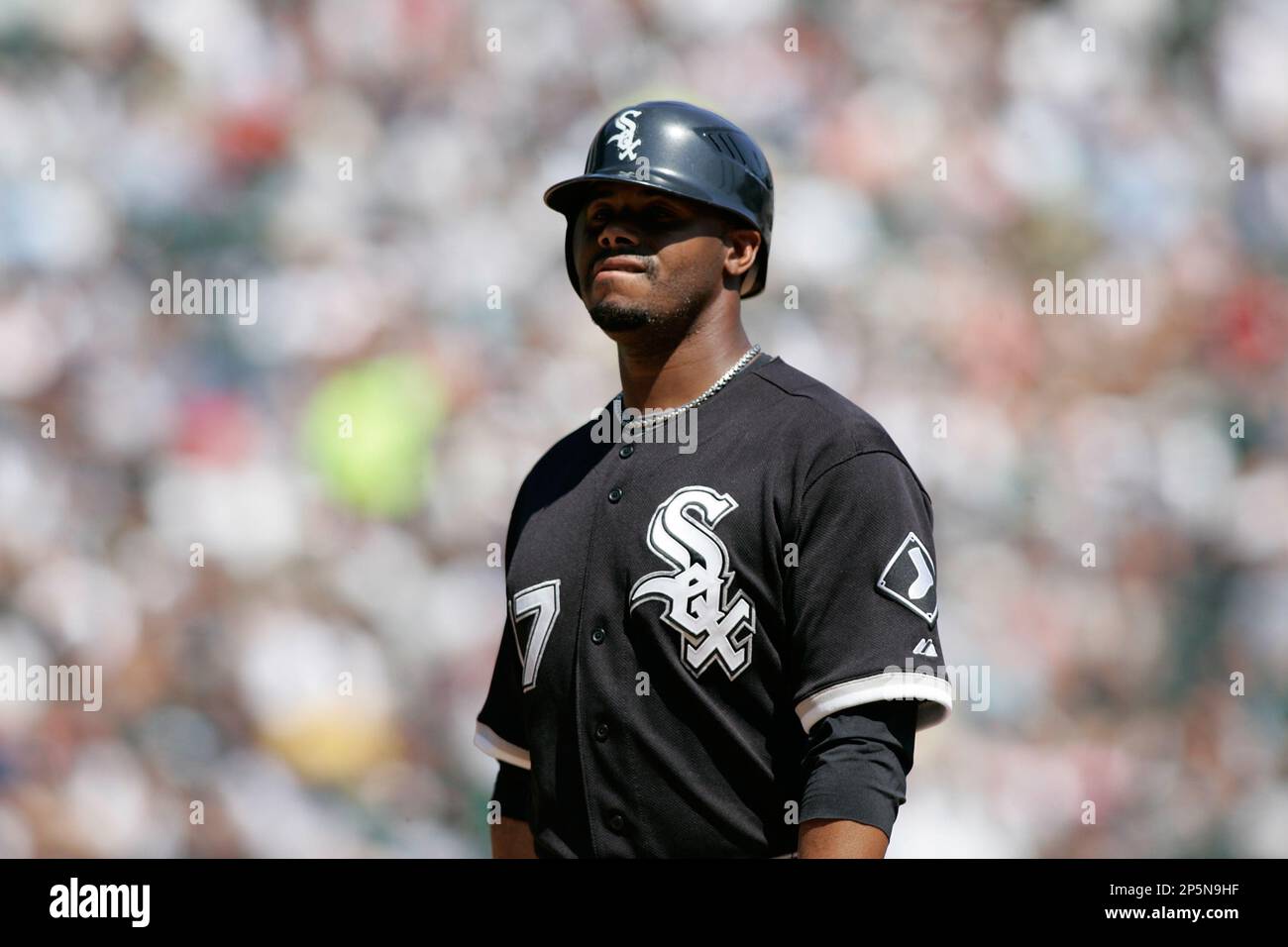 CHICAGO, IL - AUGUST 14: Outfielder Ken Griffey Jr. #17 of the Chicago White  Sox follows through on his swing after hitting the baseball against the  Kansas City Royals at the U.S.