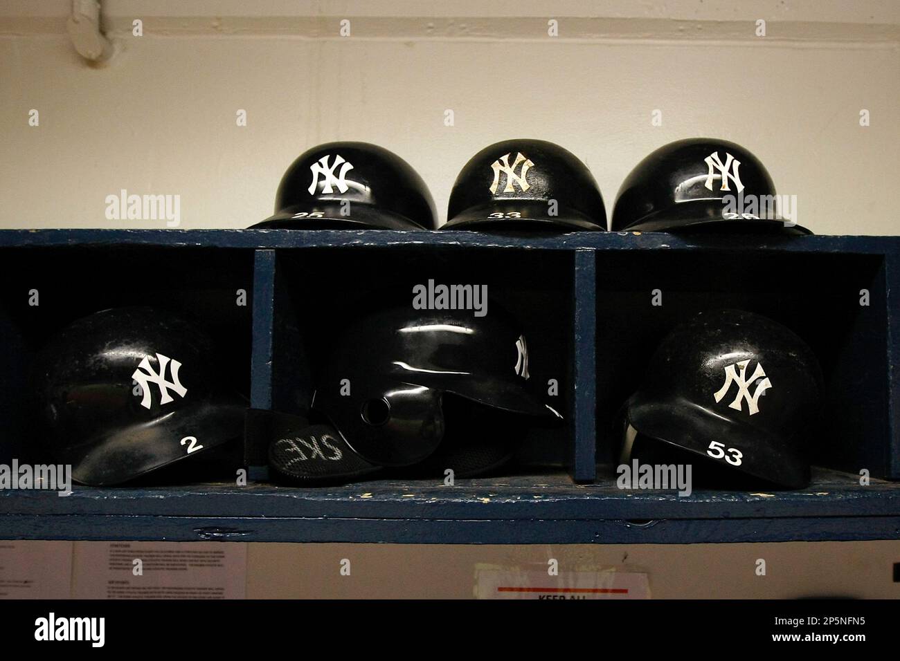 MINNEAPOLIS, MN - JULY 8: A detail view of the New York Yankees batting  helmets in the dugout during the game between the New York Yankees against  the Minnesota Twins at Hubert