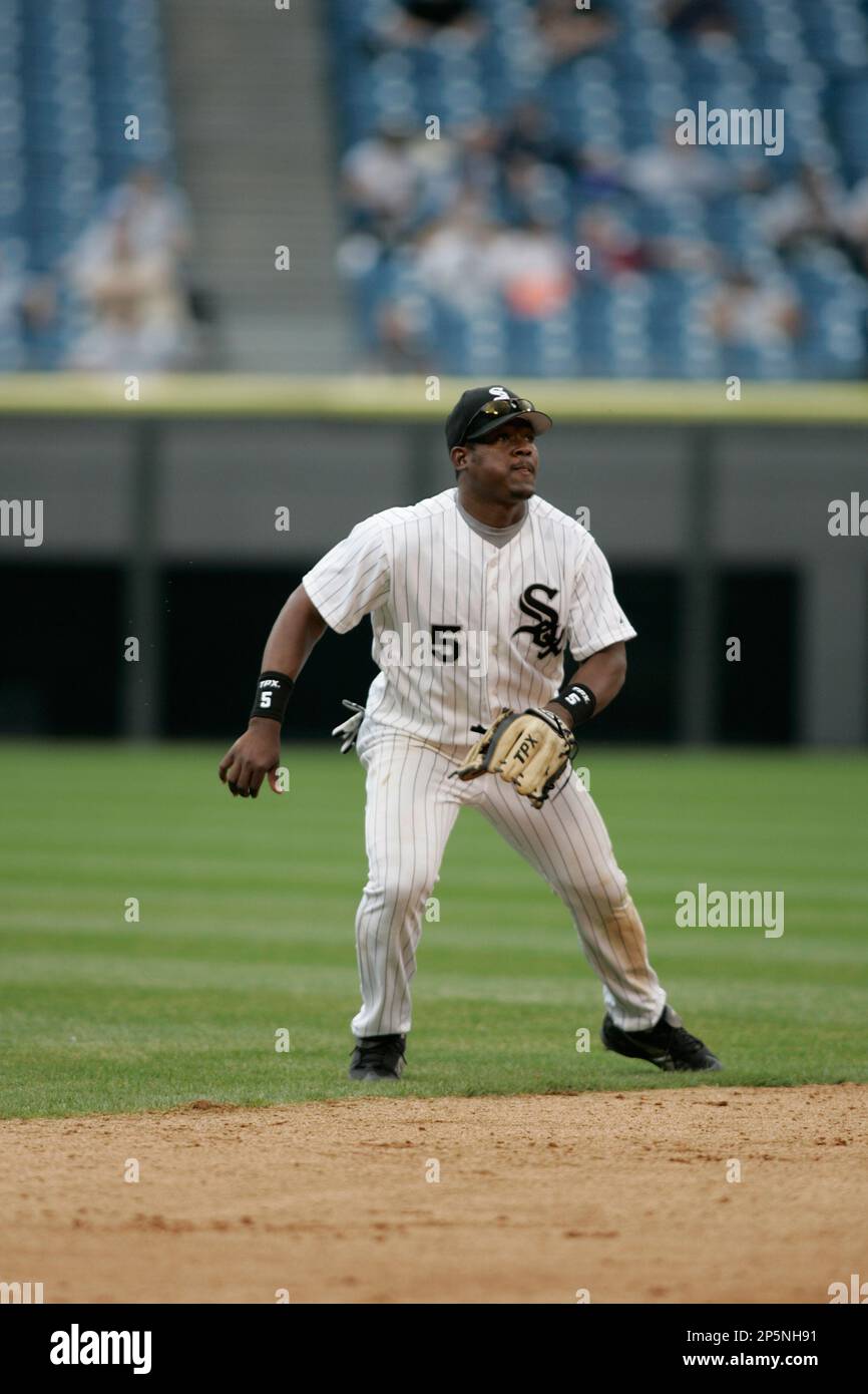 CHICAGO - APRIL 6: Juan Uribe #5 of the Chicago White Sox runs after the  baseball is hit against the Cleveland Indians at U.S. Cellular Field on  April 6, 2005 in Chicago