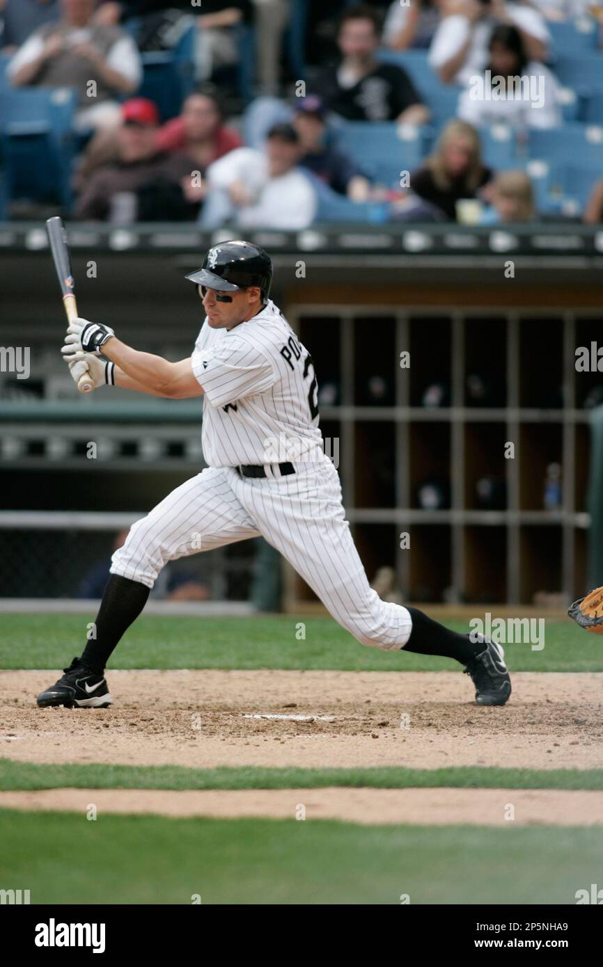 CHICAGO - APRIL 6: Scott Podsednik #22 of the Chicago White Sox swings to  hit the pitch against the Cleveland Indians at U.S. Cellular Field on April  6, 2005 in Chicago, Illinois.