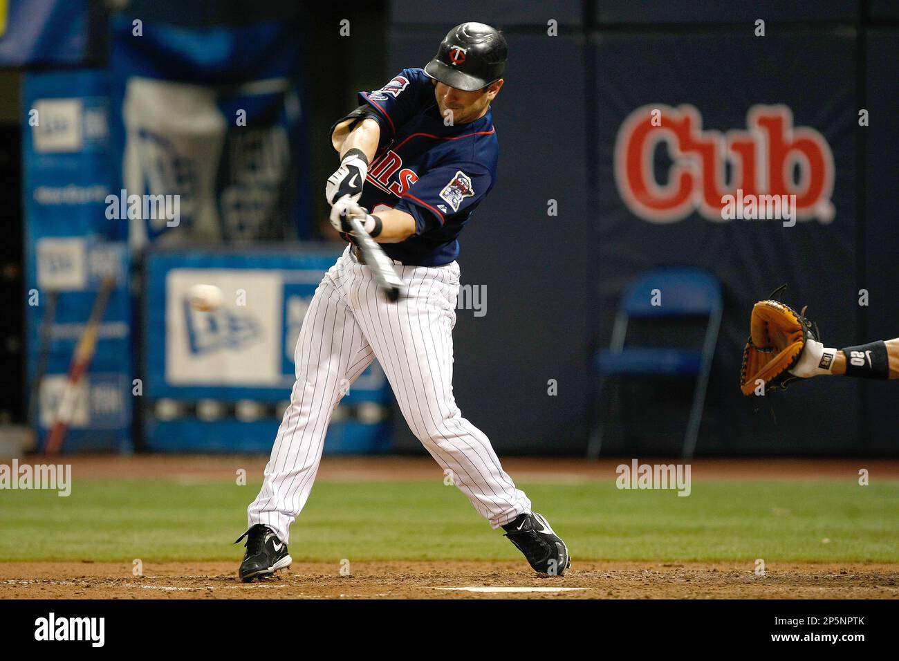 MINNEAPOLIS, MN - JULY 9: Shortstop Nick Punto #8 of the Minnesota Twins  stands ready in position against the New York Yankees at Hubert H. Humphrey  Metrodome on July 9, 2008 in