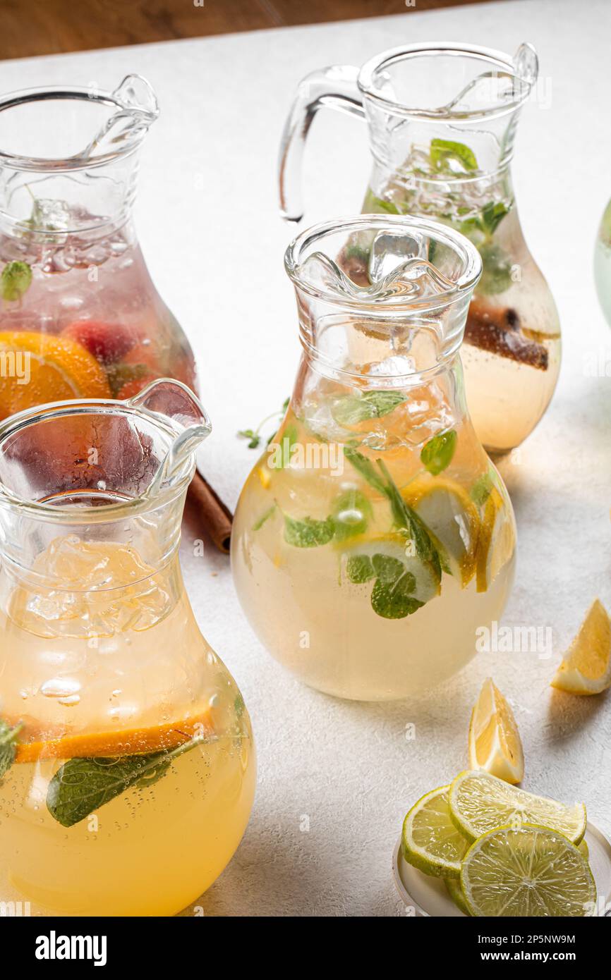 Jars of assorted variety of fresh fruit lemonades Stock Photo