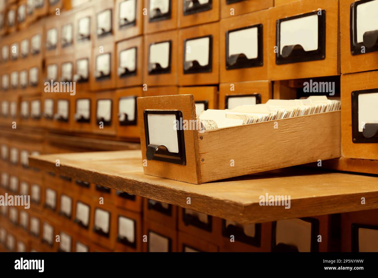 Closeup view of library card catalog drawers Stock Photo Alamy
