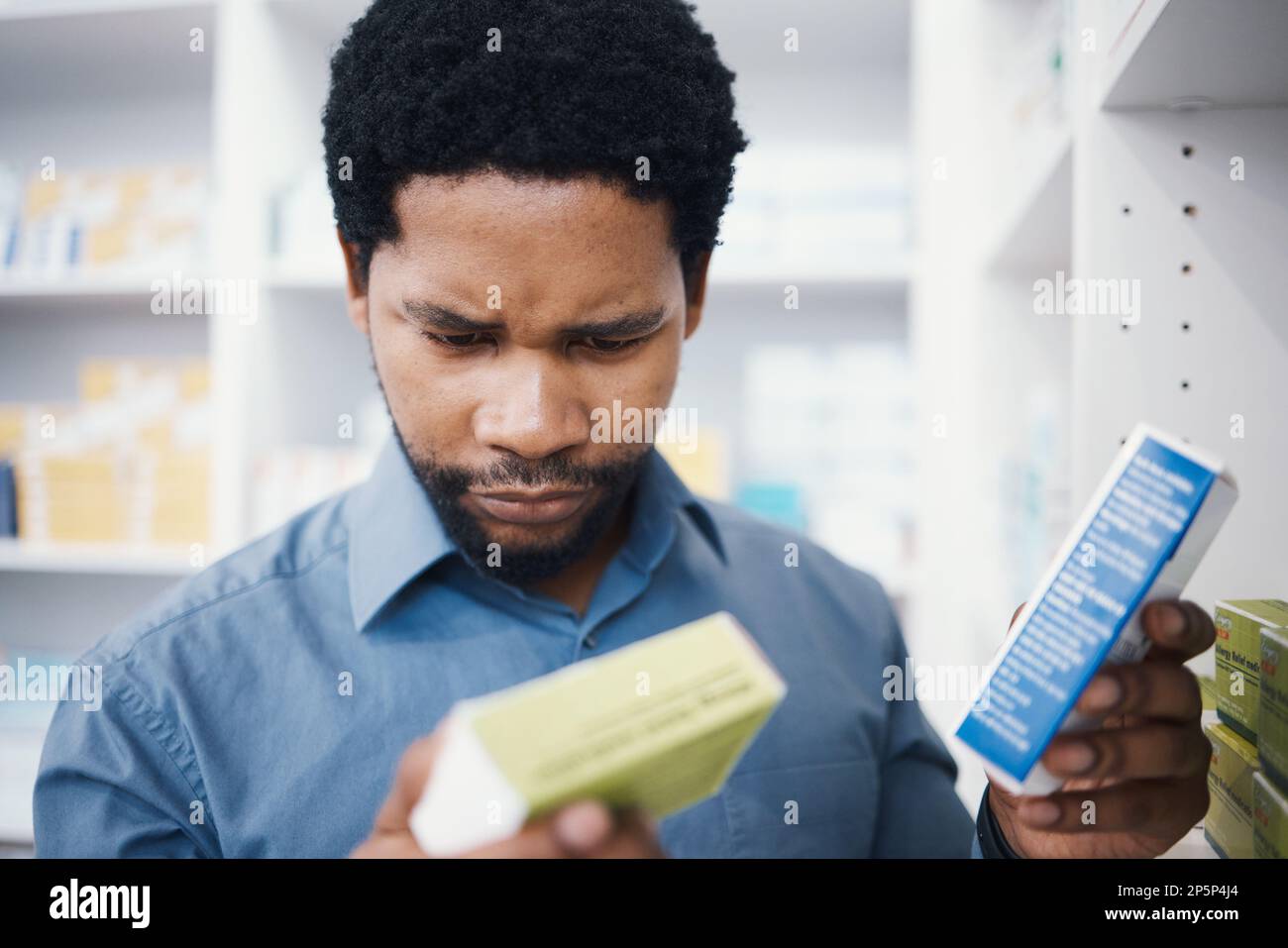 Black man, pharmacy stock check and pharmacist in a wellness, healthcare and drugs clinic