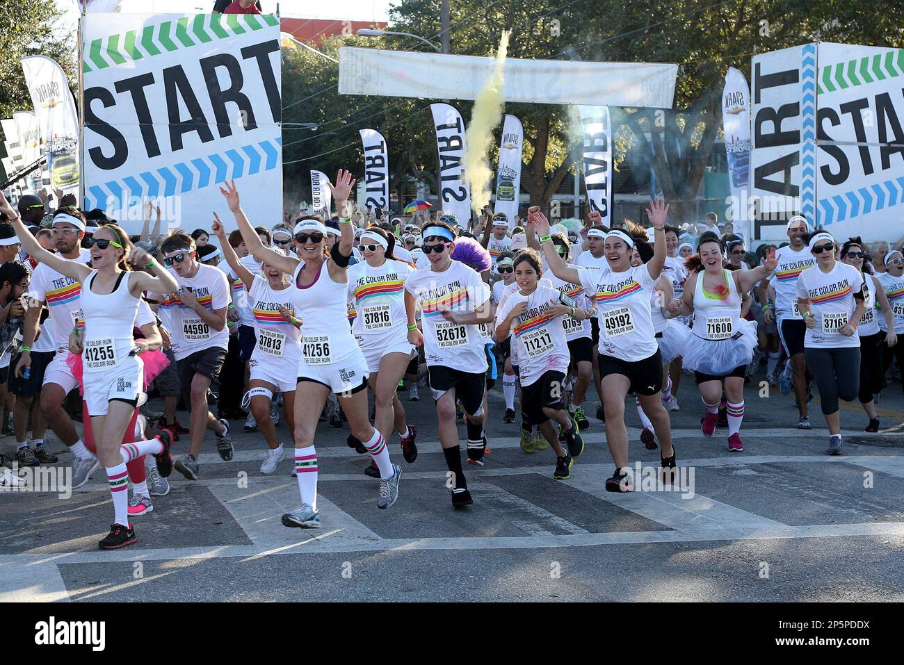 Participants of the Color Run Orlando event start the 5K. Billed as the ...