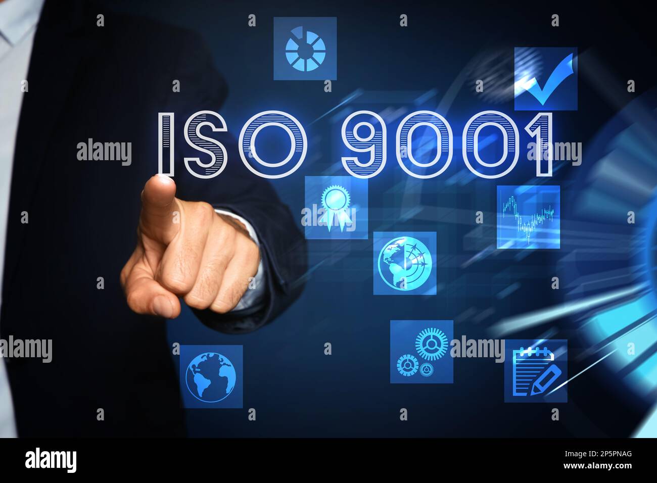 Man pointing at virtual screen with text ISO 9001 and different icons ...