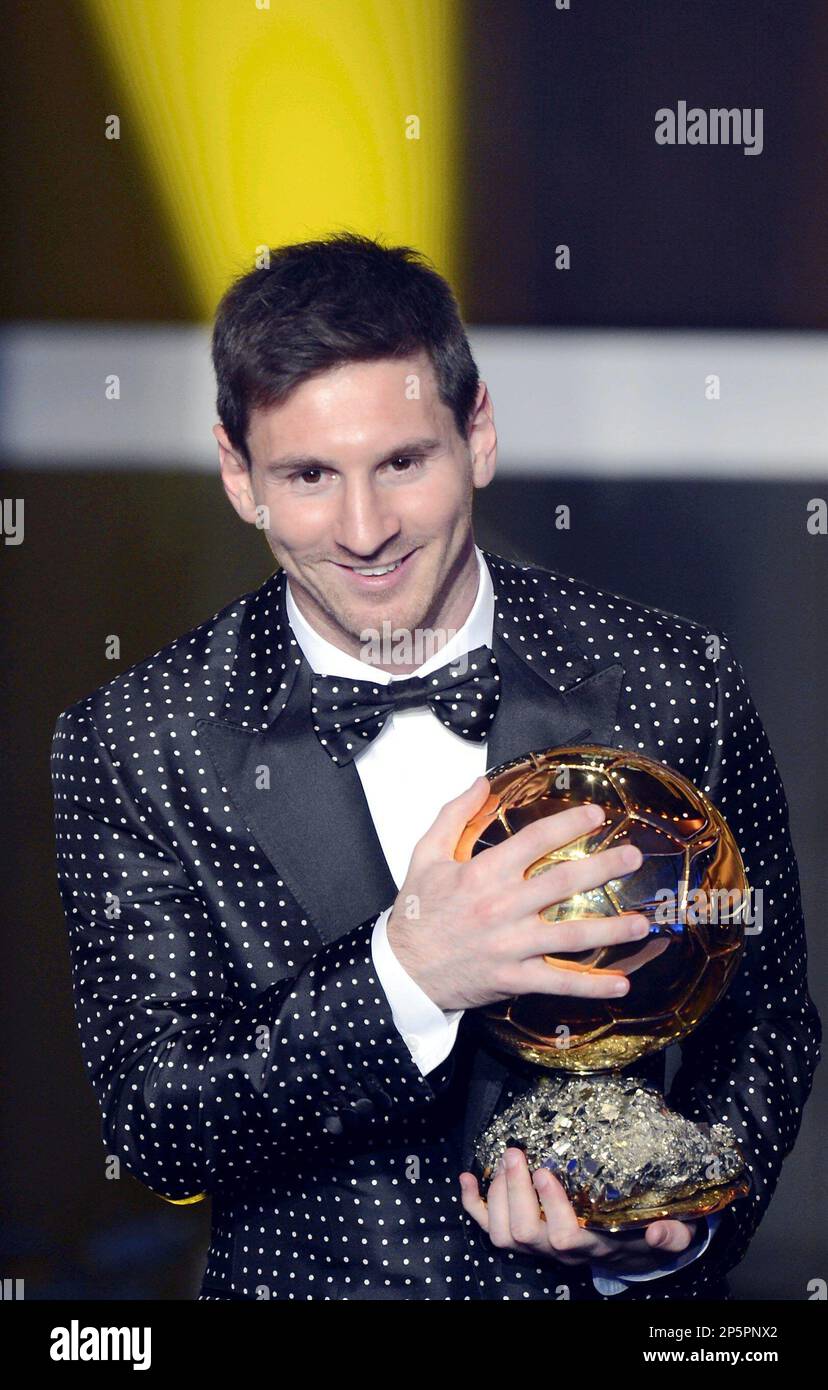 messi in formal dress Argentina's Lionel poses with the trophy after winning the FIFA Men's World Player of the Year Award during the FIFA Ballon d'Or Gala 2013 held at the Kongresshaus Zurich, Switzerland custom costume
