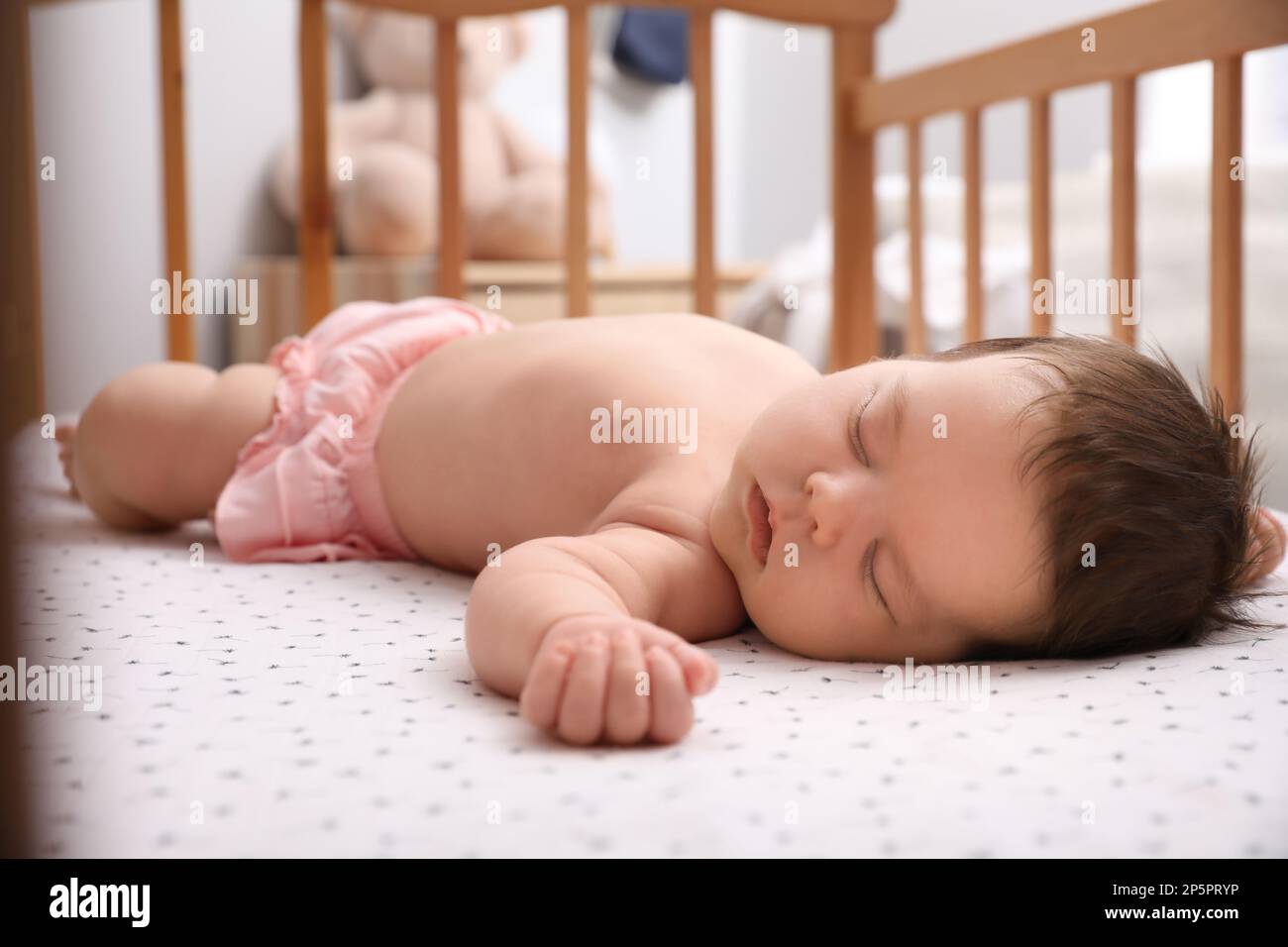 Cute little baby sleeping in crib at home. Bedtime Stock Photo Alamy