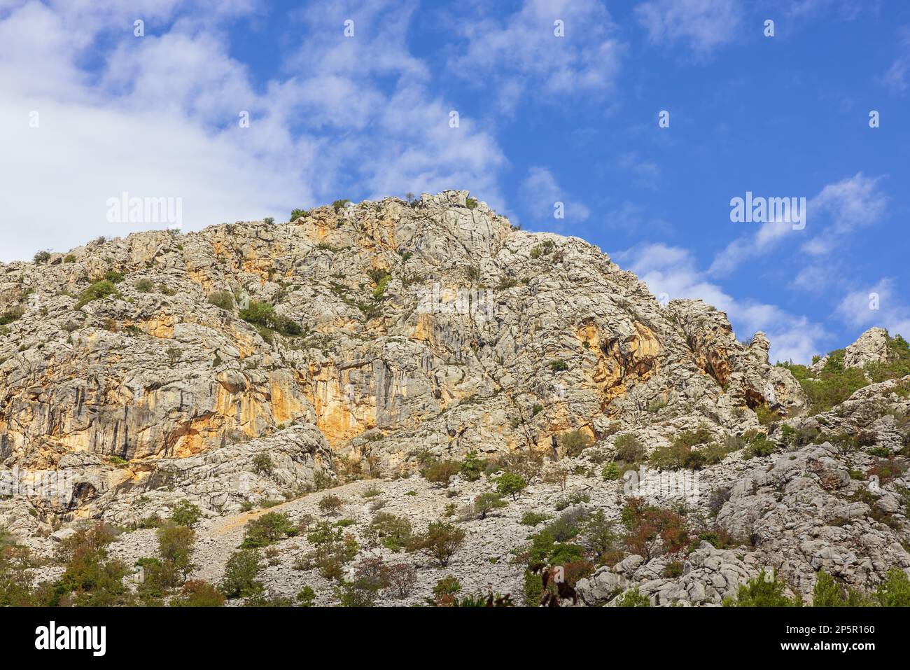 Rugged mountain peaks of the Velebit Mountain range along the access road from Starigrad Paklenica into the National Park Stock Photo