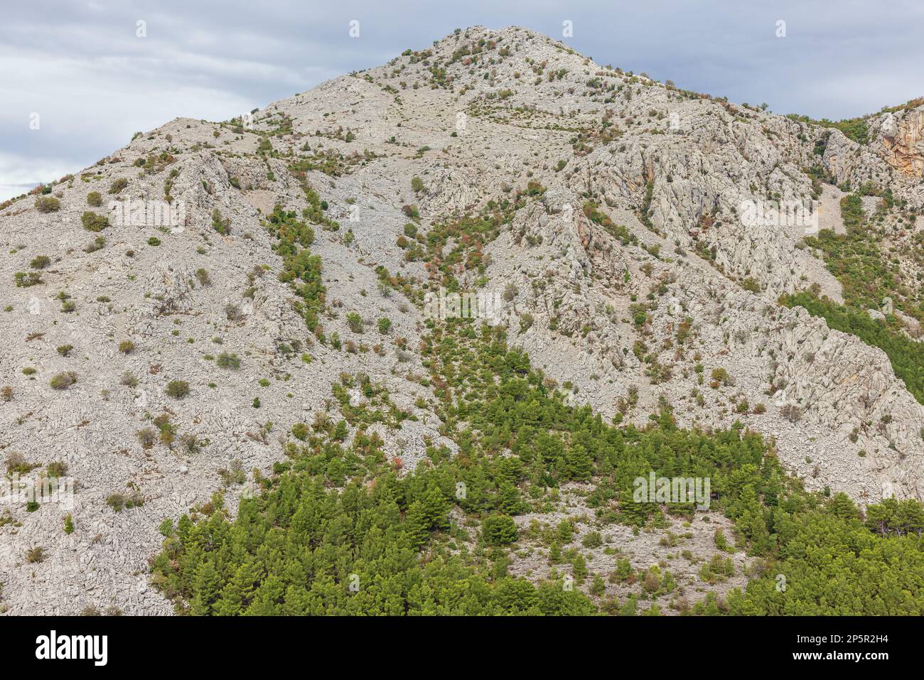 Rugged mountain peaks in the Paklenica National Park seen from the Paklaric viewpoint at the entrance of the Paklinica National Park Stock Photo