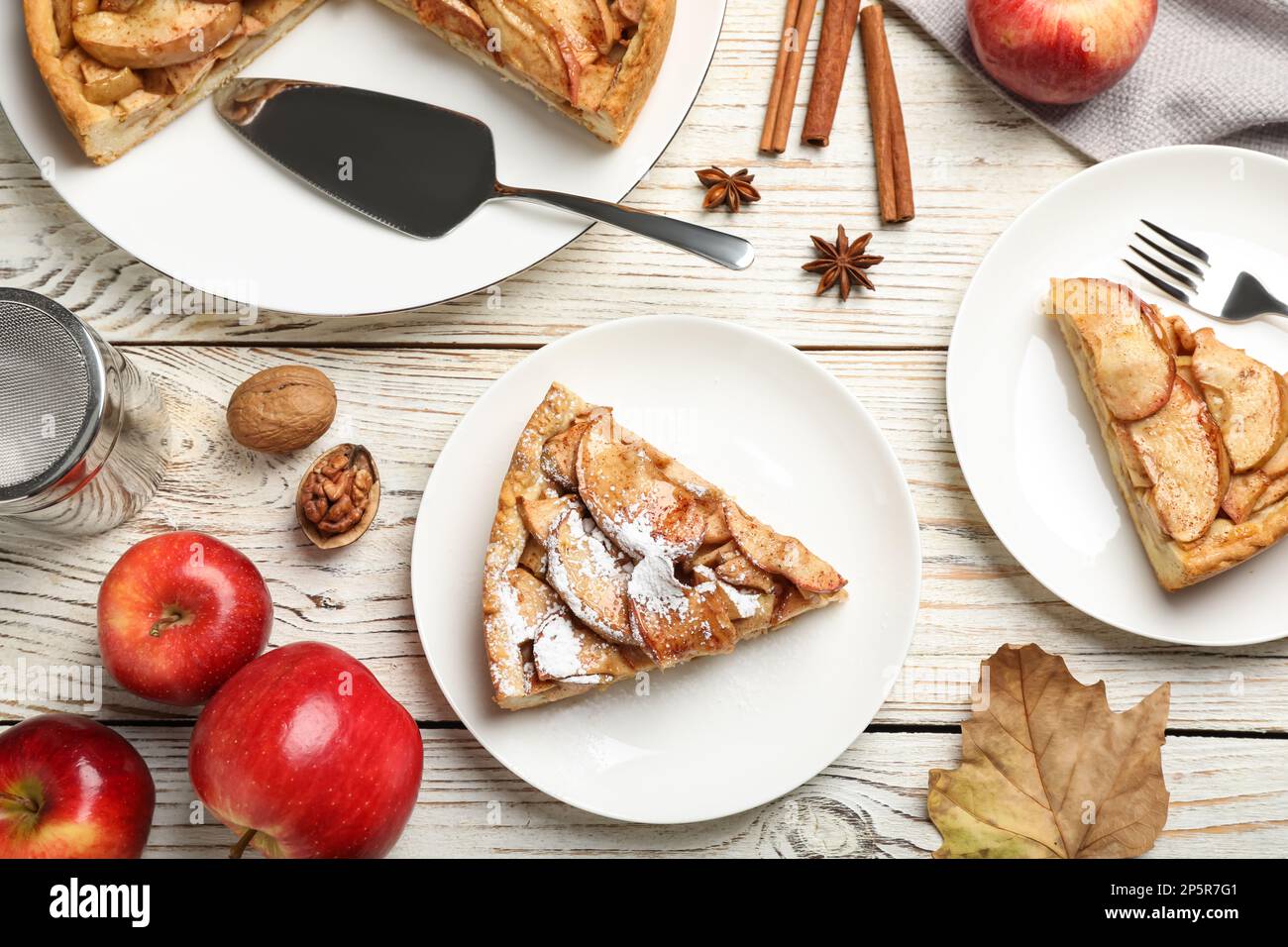 Flat lay composition with delicious apple pie on white wooden table Stock Photo
