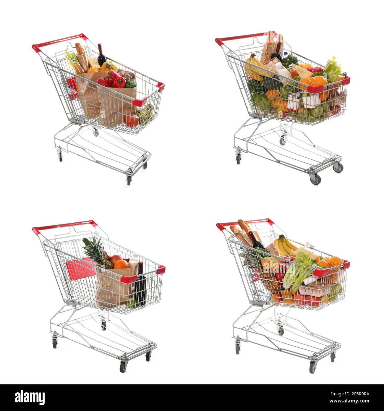 Set with shopping carts full of groceries on white background Stock