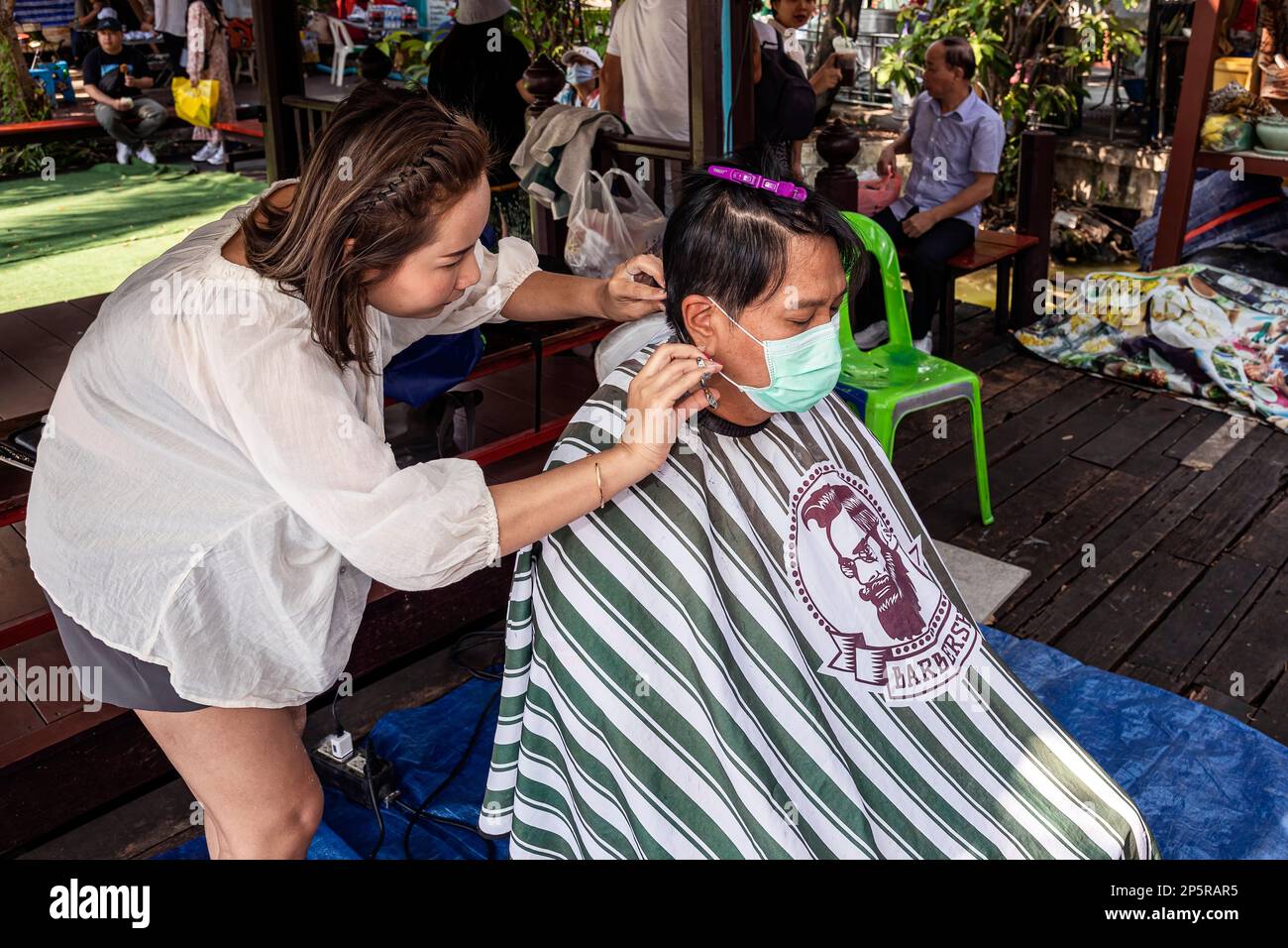 Open air hair salon and barber shop, Taling Chan Floating Market, Bangkok, Thailand Stock Photo