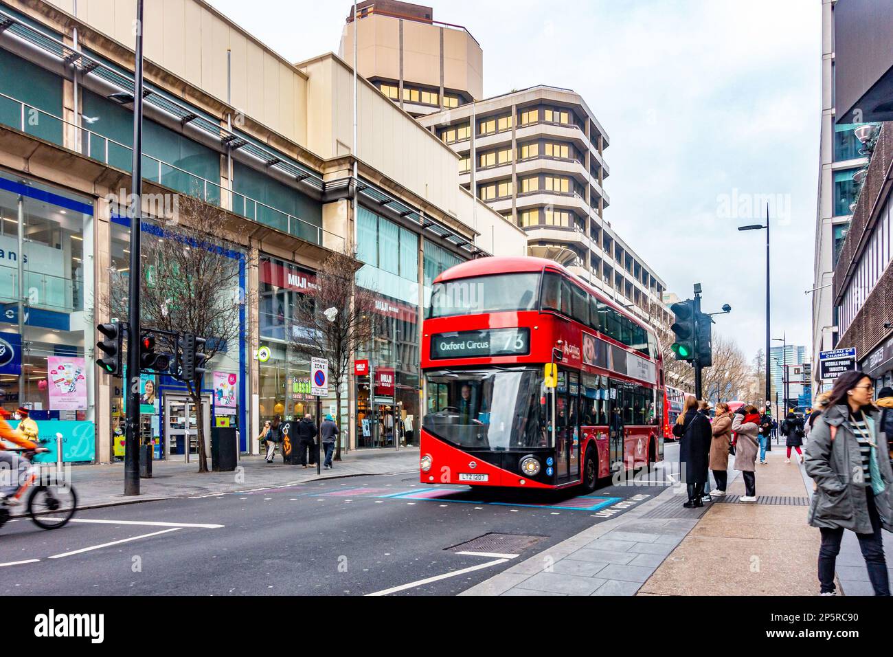 An iconic, red, London double decker bus on Tottenham Court Road Stock Photo