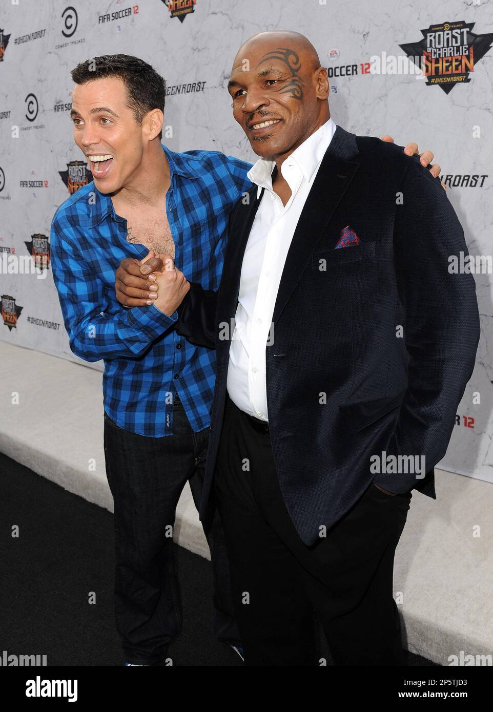 LOS ANGELES, CA SEPTEMBER 10 SteveO and Mike Tyson arrive at the