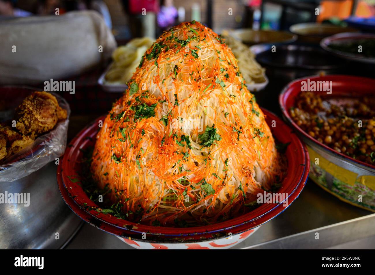 Delicious and popular coriander jelly in a traditional market in Urumqi, Xinjiang, China Stock Photo