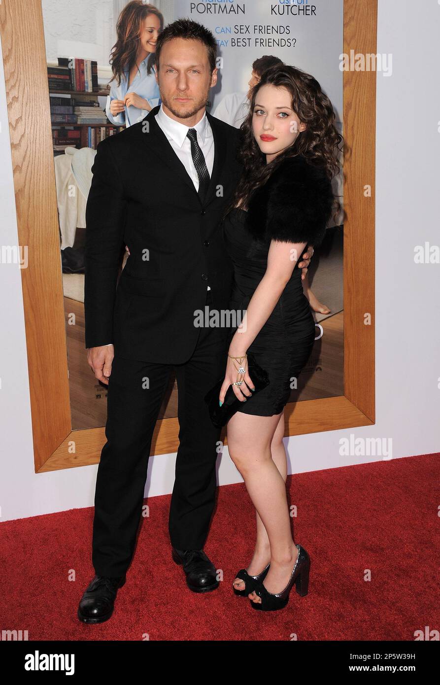 WESTWOOD, CA - JANUARY 11: Actress Kat Dennings (R) arrives at the 