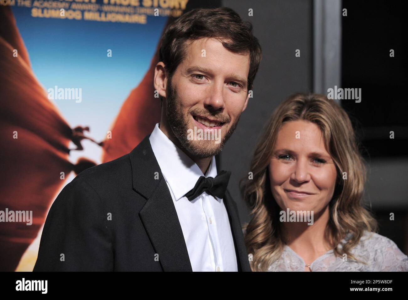 BEVERLY HILLS, CA - NOVEMBER 03: Aron Ralston (L) and Jessica Trusty