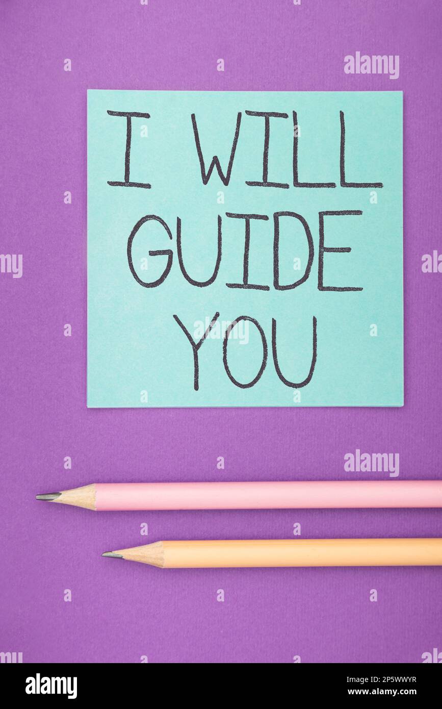 Hand writing sign I Will Guide You. Conceptual photo Help showing a route Influence to do or