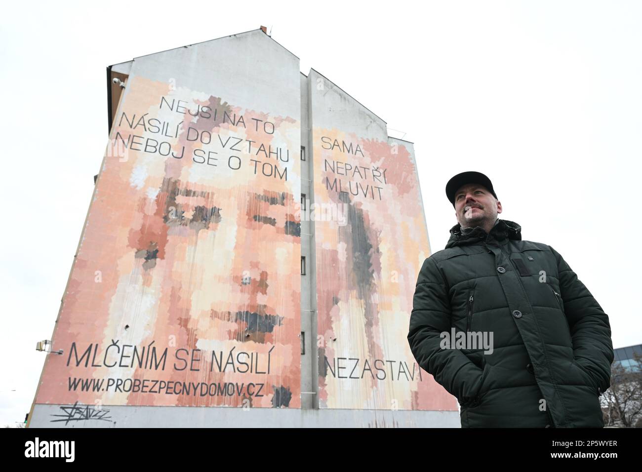 Prague, Czech Republic. 07th Mar, 2023. A mural by street art artist David Strauzz, pictured, was unveiled on March 7, 2023, in Prague, Czech Republic, during the press conference of the furniture company IKEA and the organization NeNa on the amendment of the law to help victims of domestic violence. Credit: Michal Kamaryt/CTK Photo/Alamy Live News Stock Photo