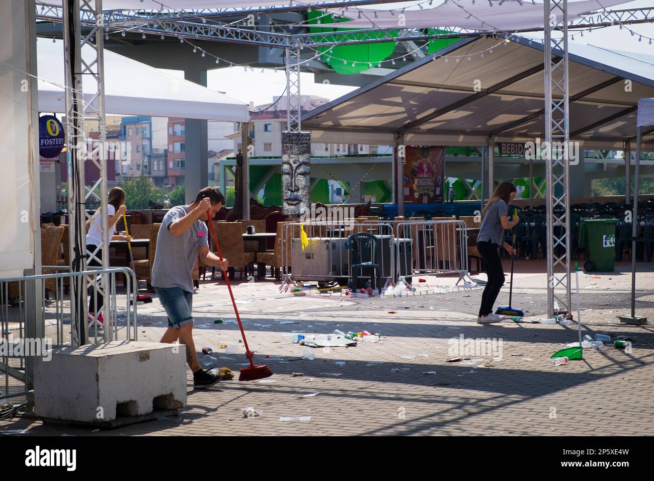Staff cleaning the stage after a show in Gandia Spain Stock Photo