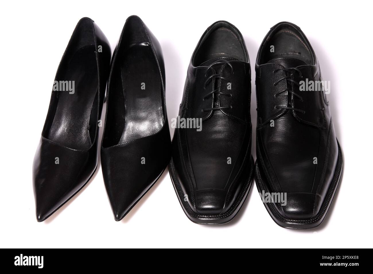 black pumps and men's shoes Stock Photo Alamy