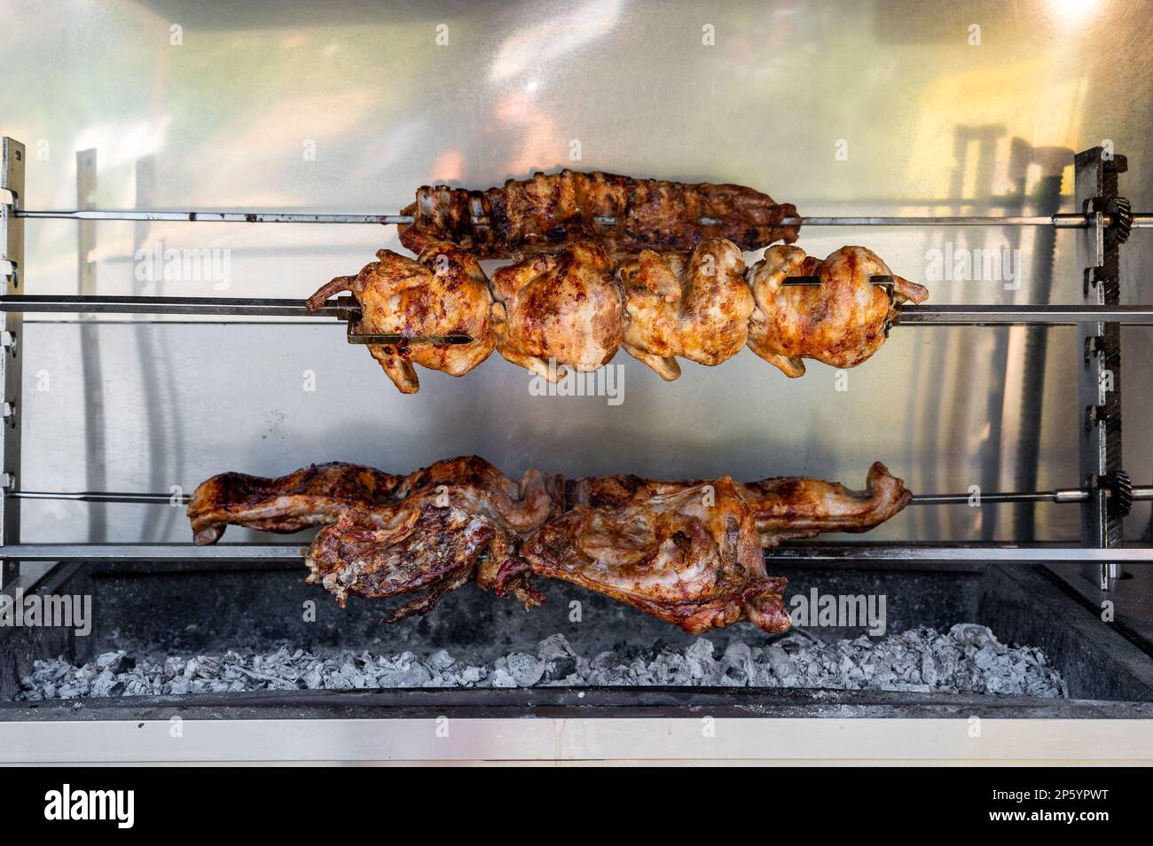 Roadside restaurants spit grill skewers barbecue in Crete, Greece. BBQ