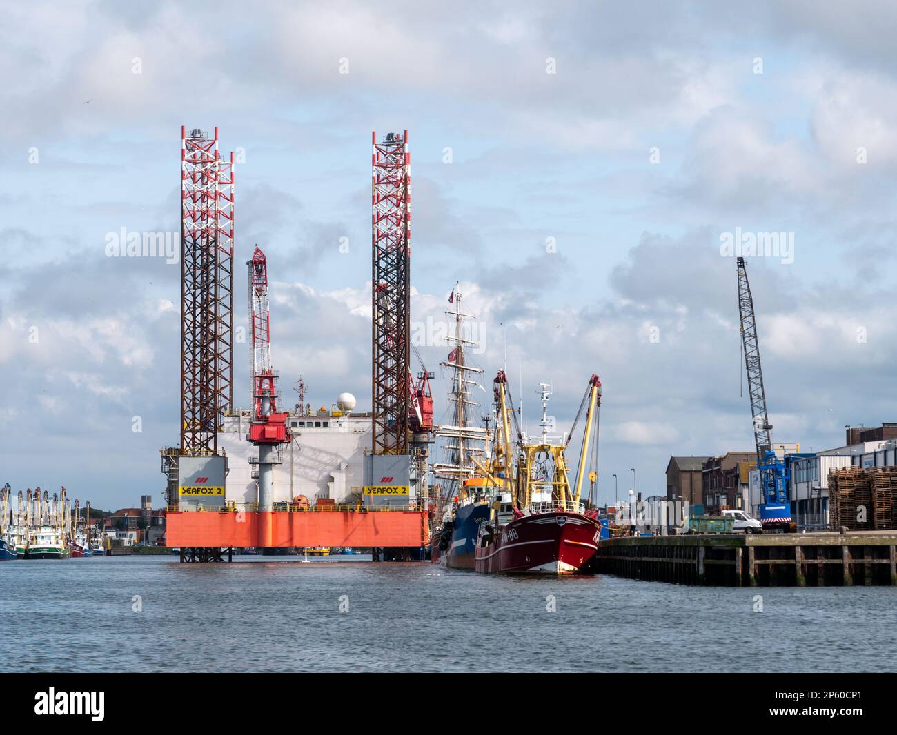 Offshore platform moored at quay in Vissershaven of IJmuiden, Netherlands Stock Photo